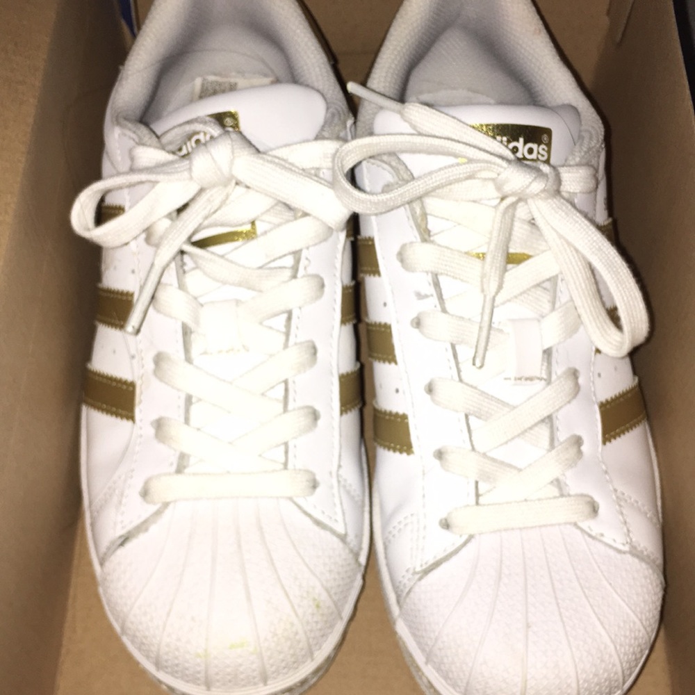 Gold Adidas Superstars! Size 4 in kids